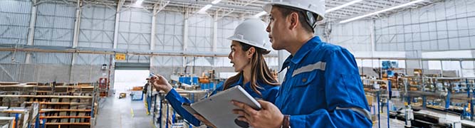 Warehouse employees using asset management solutions from Bell for maximizing ROI.