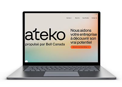 Le site Web d’Ateko affiché dans l’écran d’un ordinateur portabel.